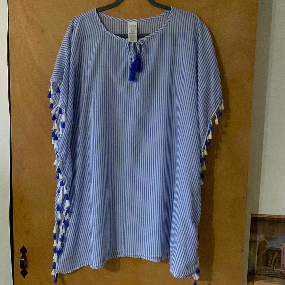 Blue and white striped swim cover with tassels